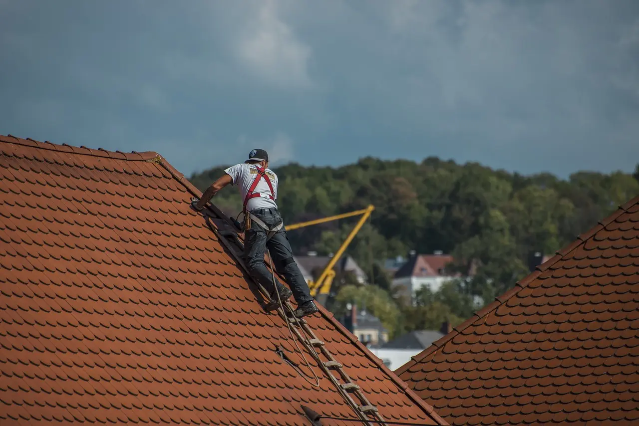 Metal roofer Standing on a metal roof